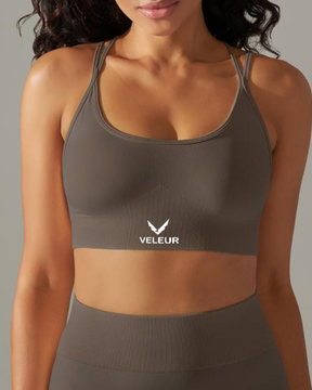 Veleur CrissCross Bra, nahtloser Sport-BH für Damen mit überkreuzten, verstellbaren Trägern, atmungsaktiv und bequem, ideal für Training und Alltag.