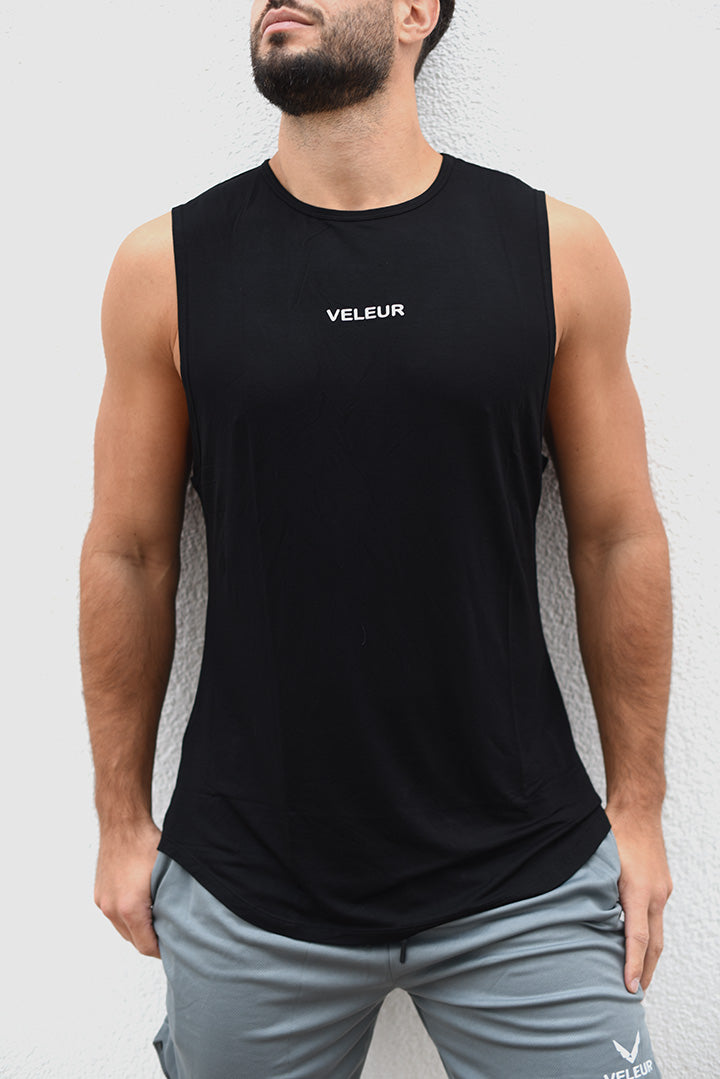 Veleur Bambooflex Tank T-Shirt, ärmelloses Design aus 95% Bambus und 5% Spandex, in Schwarz, atmungsaktiv und elastisch für Workouts und Freizeit.