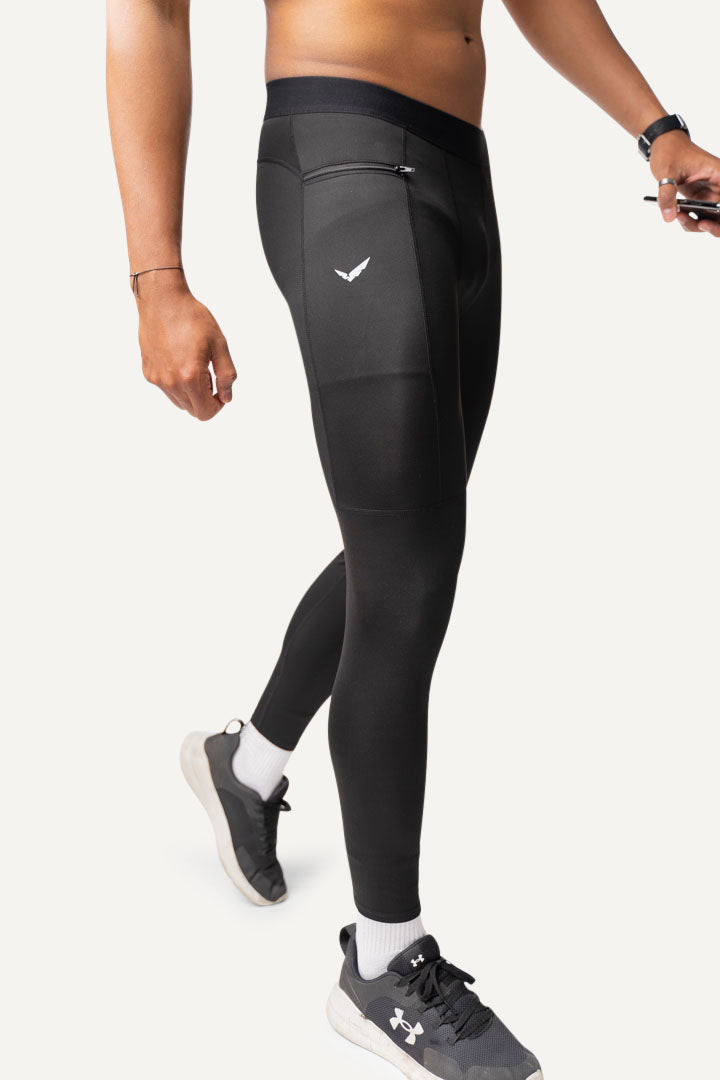 Veleur Dynamic Baselayer, atmungsaktive Kompressionshose mit Dry Technology und verschließbarer Zip-Tasche, ideal für intensives Training